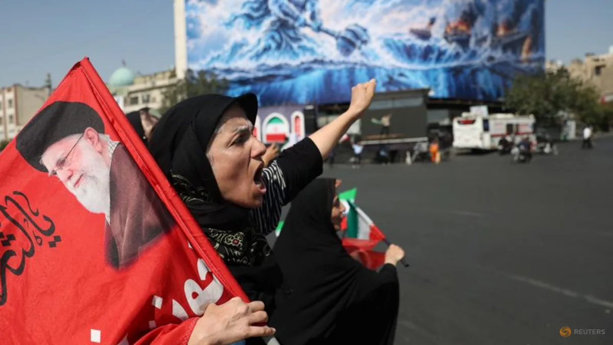 Bendera Amerika Serikat dan Iran serta suasana konflik di kawasan Teluk