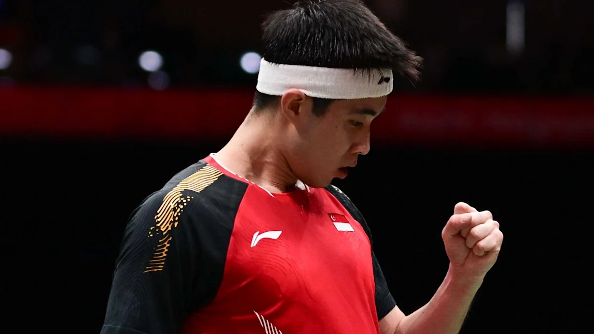 Loh Kean Yew merayakan kemenangan di ajang Asian Games Nagoya