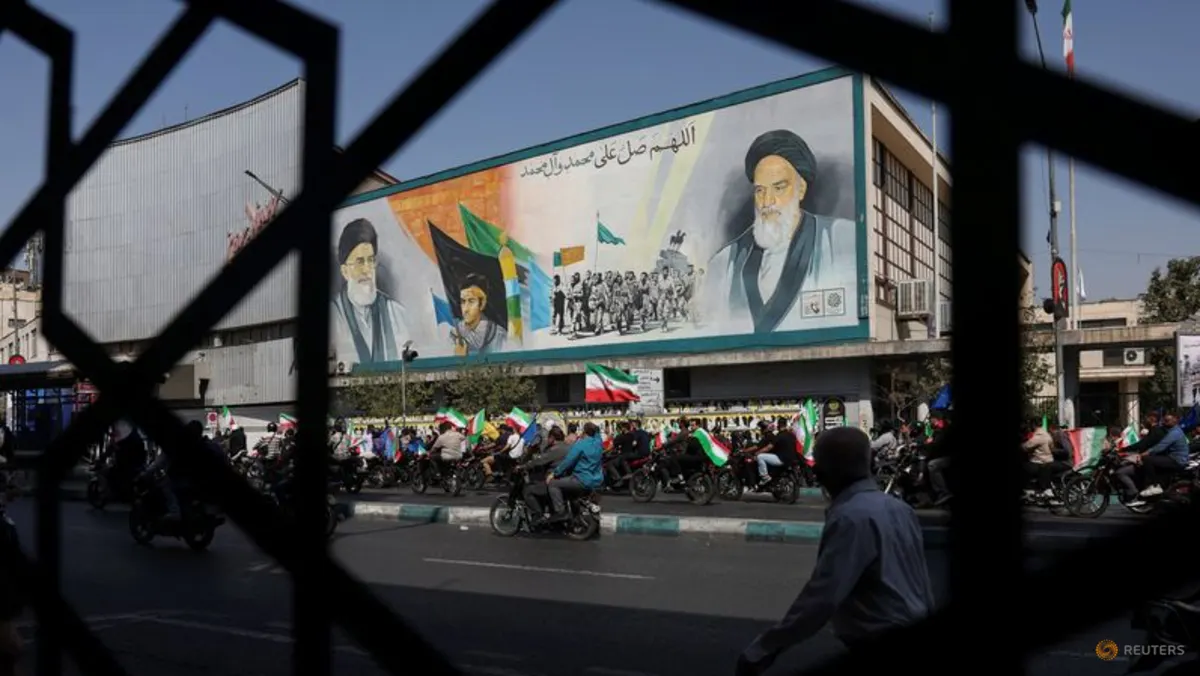 Pasukan milisi Iran Basij mengikuti pawai di Teheran