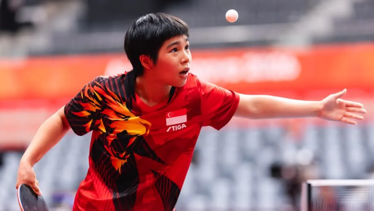 Pemain tenis meja putri Singapore Loy Ming Ying beraksi dalam pertandingan Asian Games melawan Hong Kong.