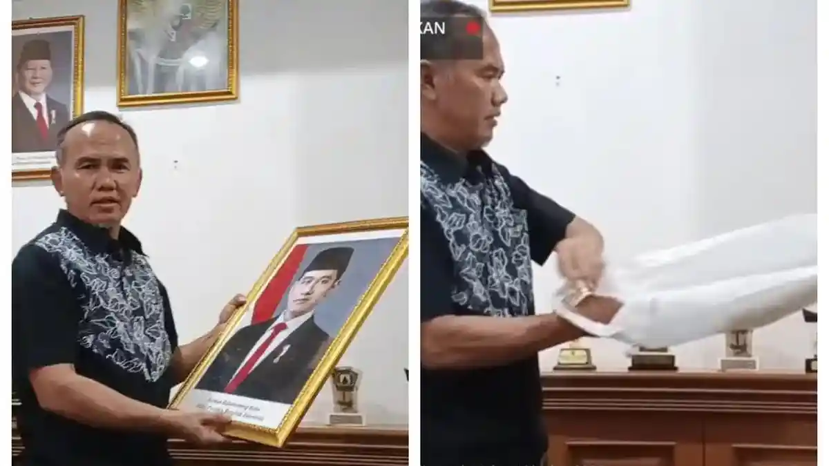 Wakil Ketua DPRD Kota Sukabumi Rojab Asy'ari menurunkan foto Gibran Rakabuming Raka